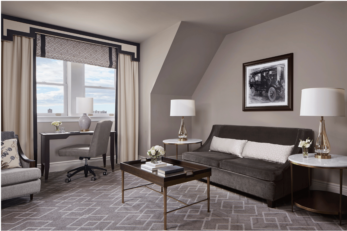 a room with a couch and a desk