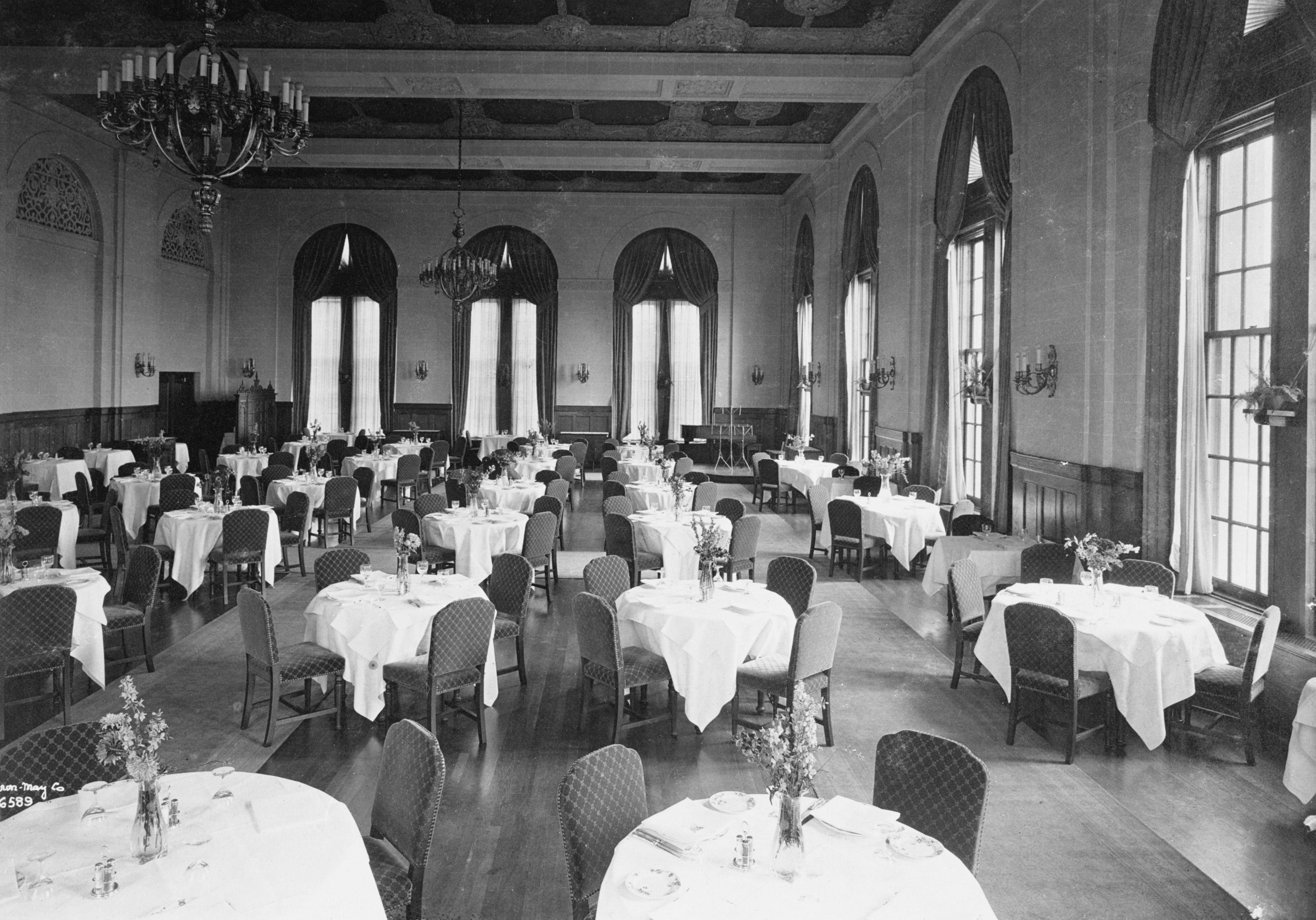 a room with tables and chairs