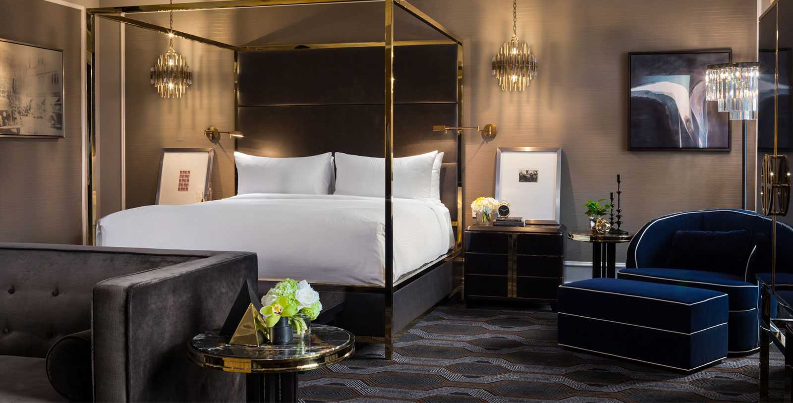 a bedroom with a canopy bed and a chair