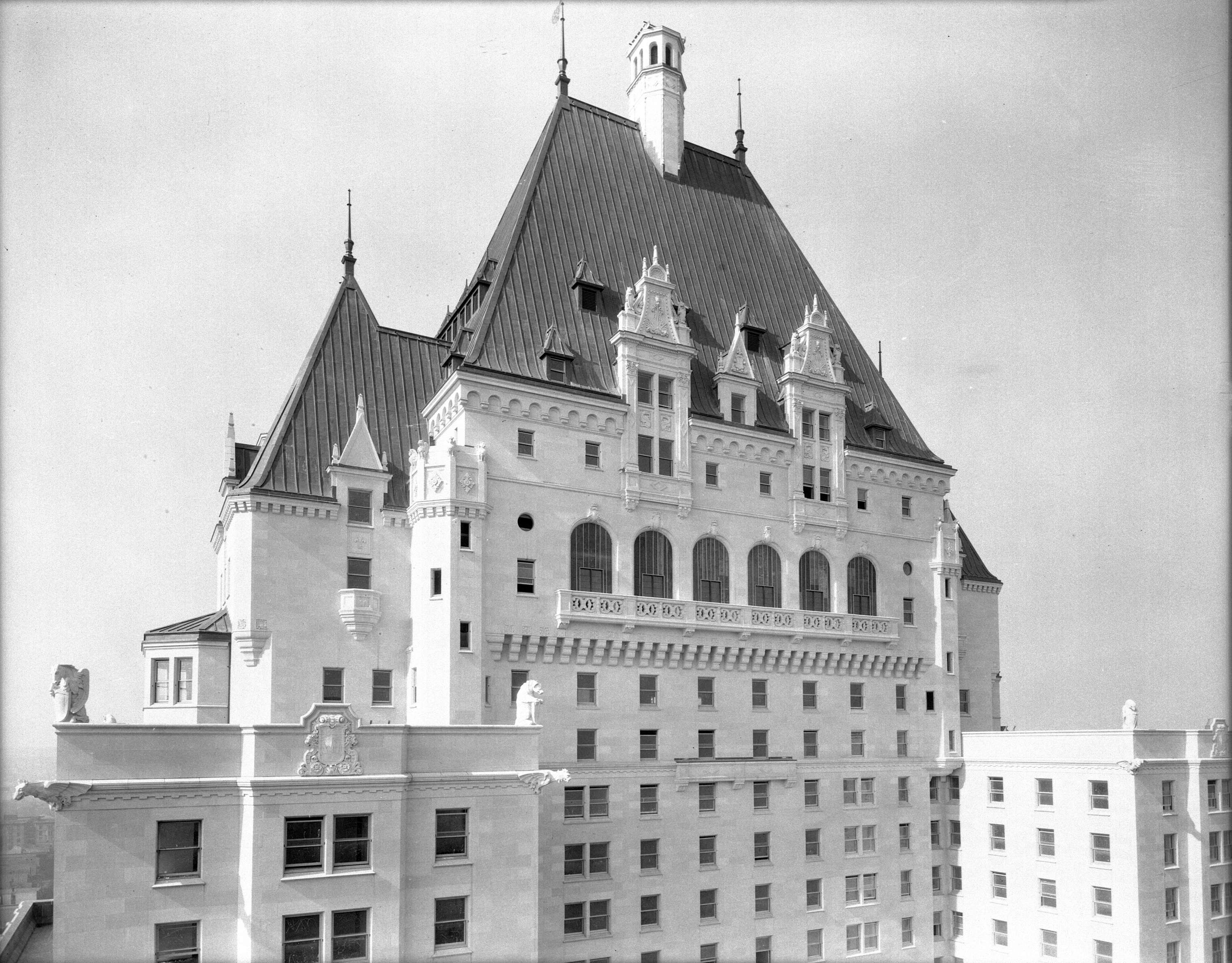 a large white building with a pointed roof