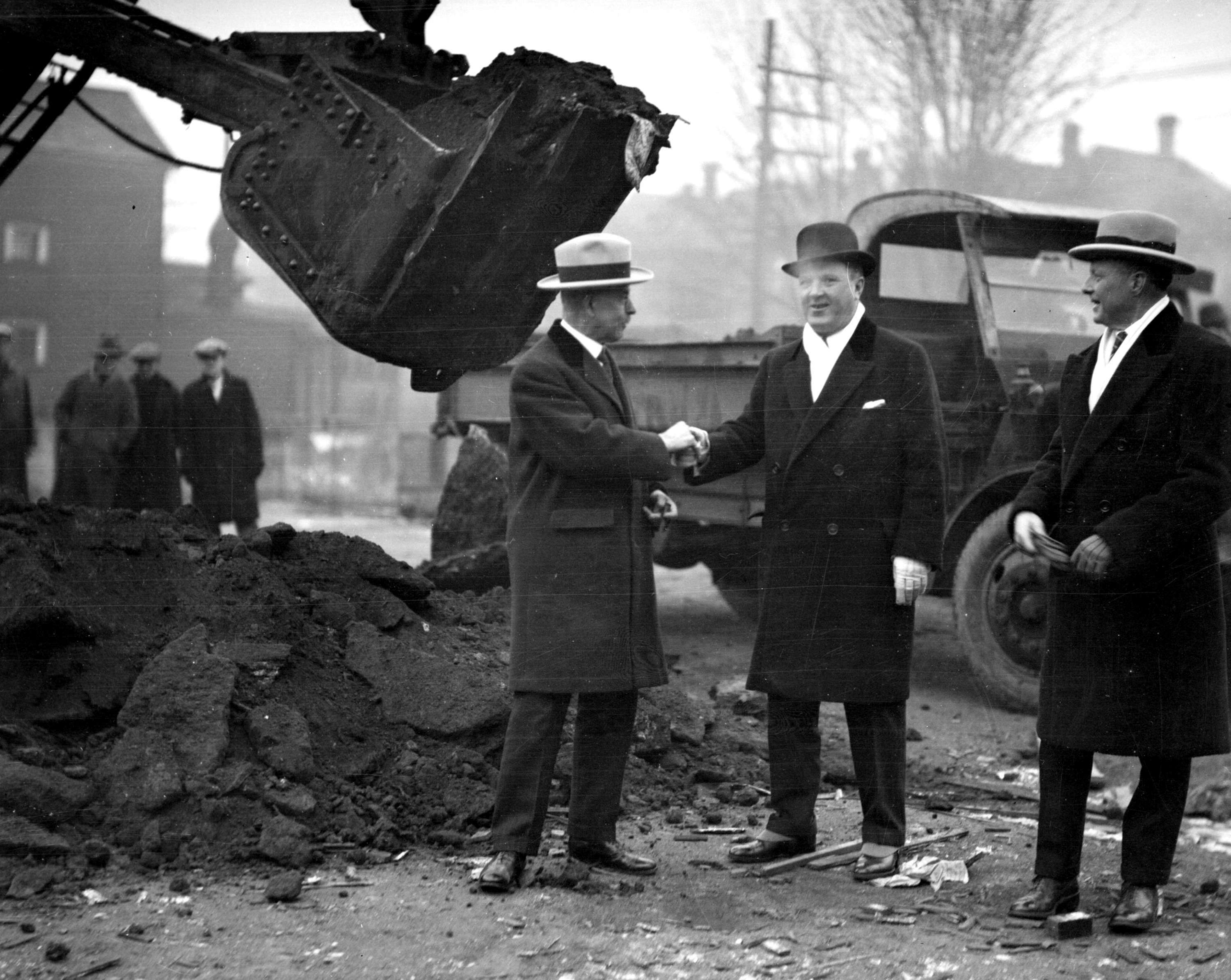 a group of men shaking hands