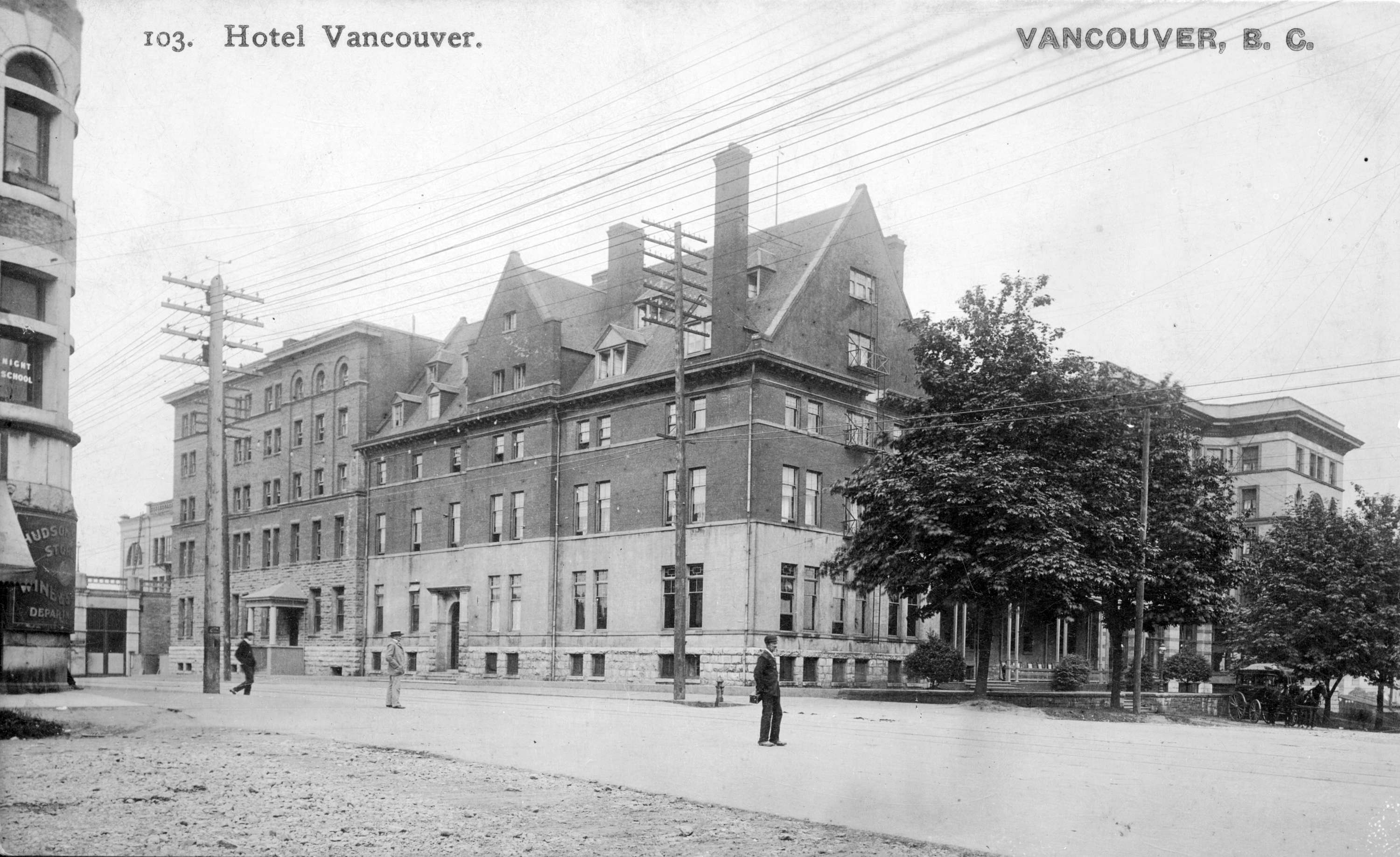 a man standing in front of a large building
