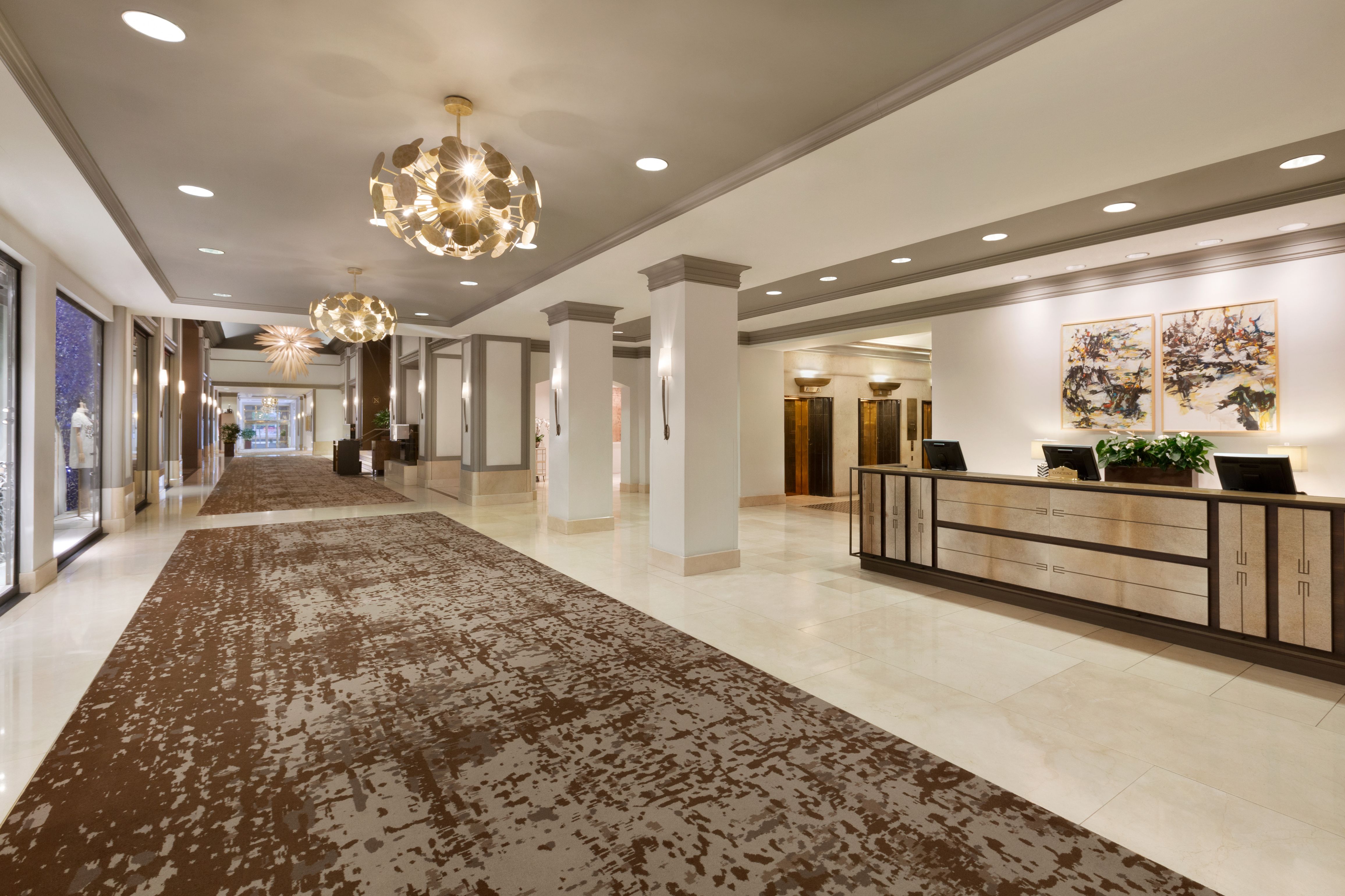 a large hall with a large counter and a brown rug