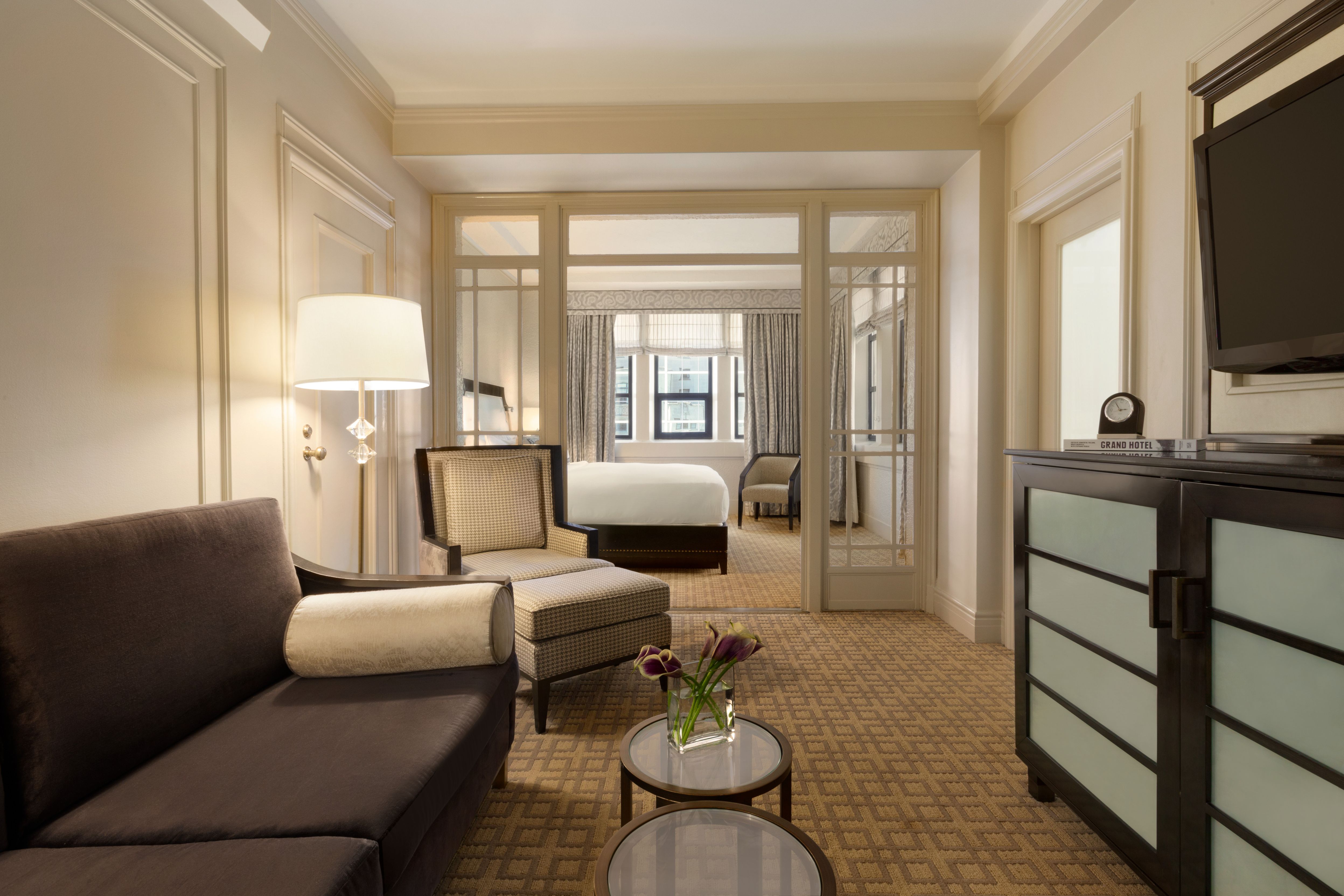 a room with a couch and a bed