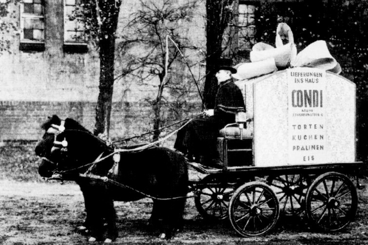 a man riding a horse carriage