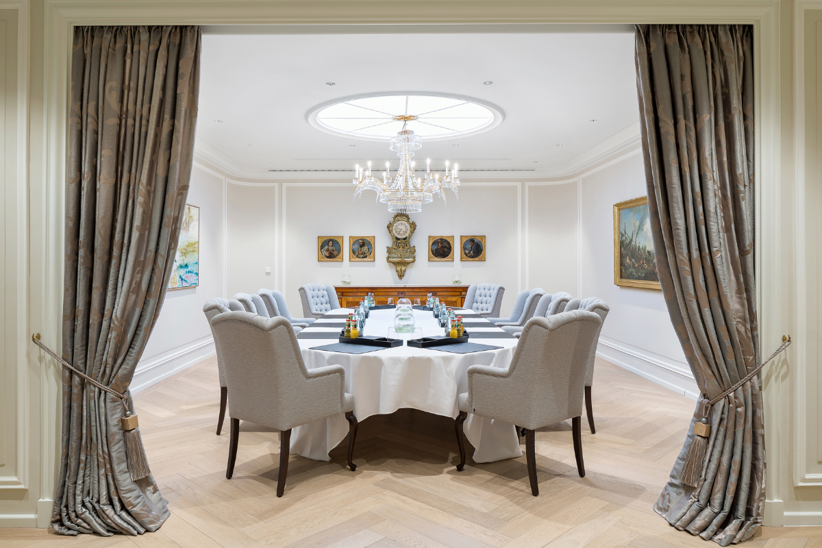 a room with a table and chairs