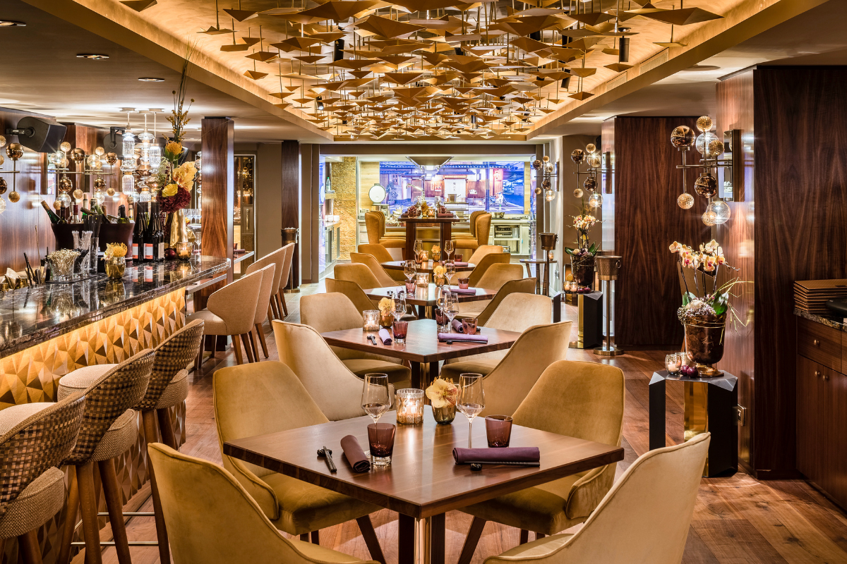 a restaurant with tables and chairs