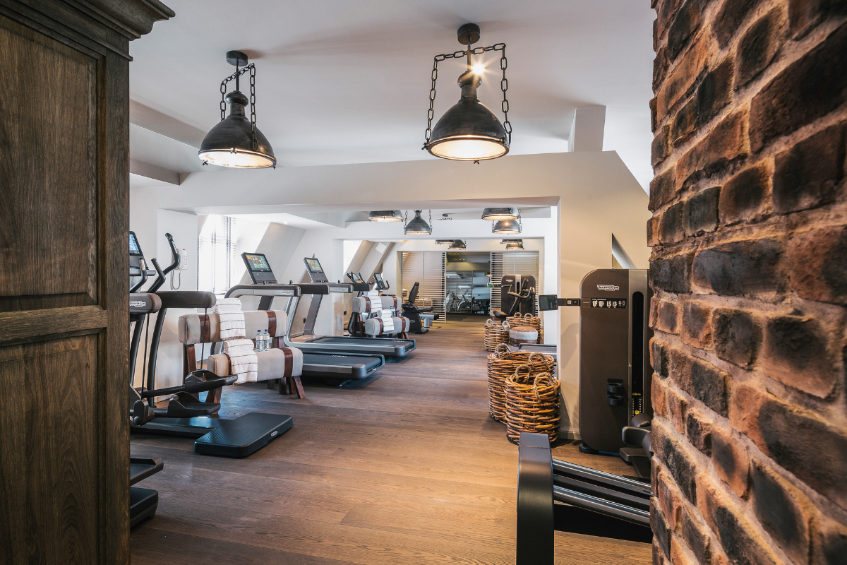a gym with treadmills and exercise equipment