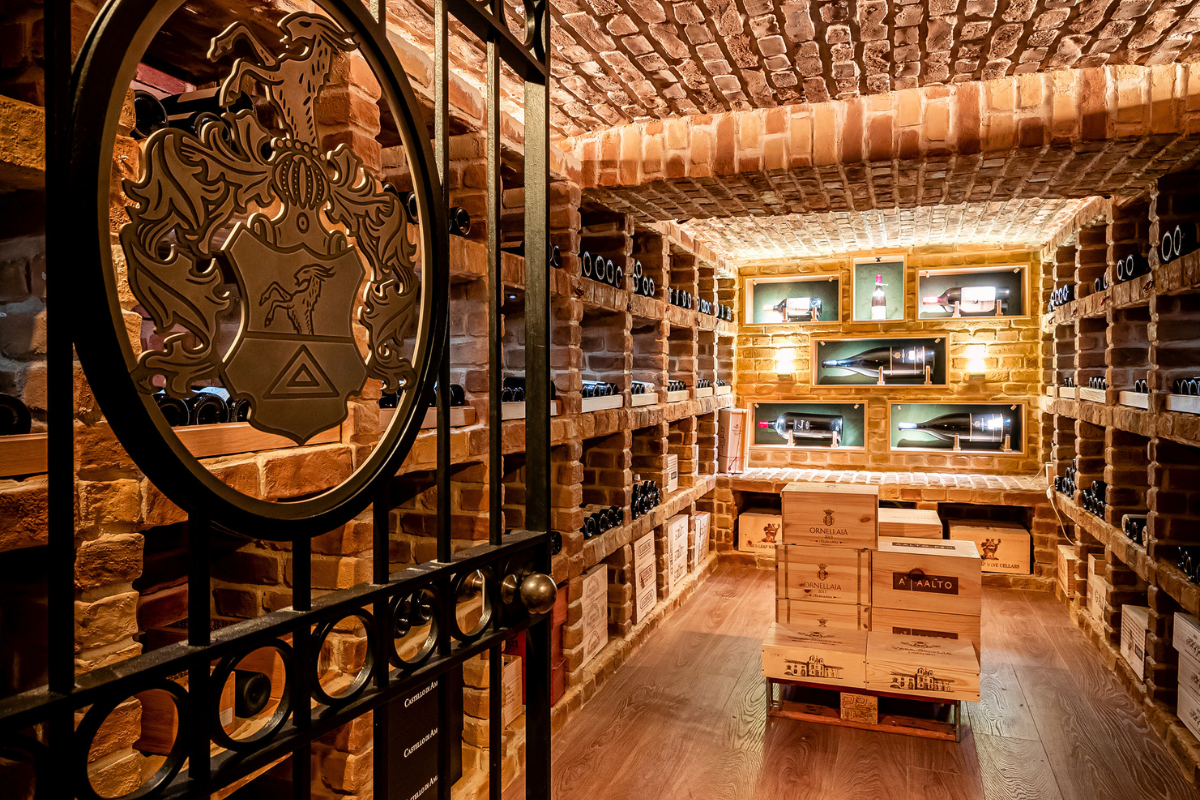 a wine cellar with a door open