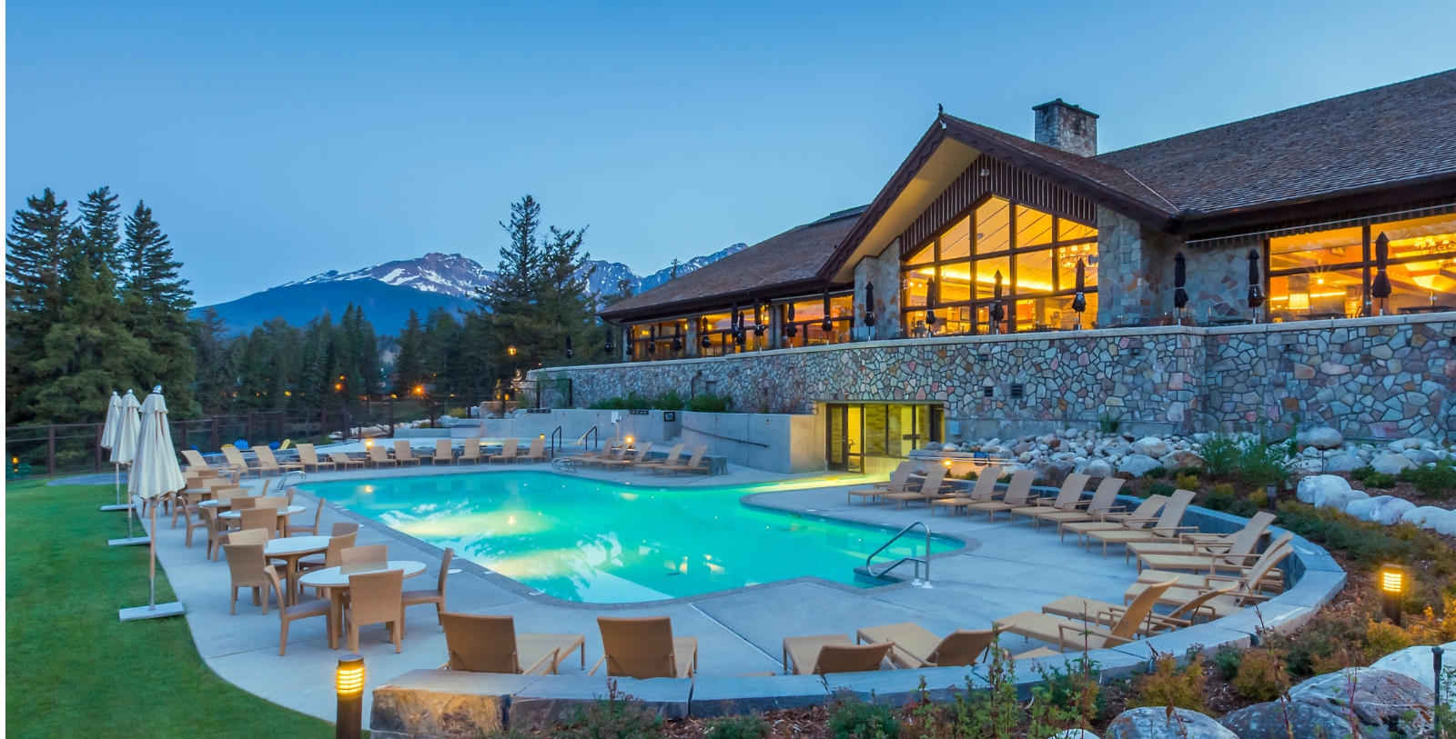 a pool with chairs around it