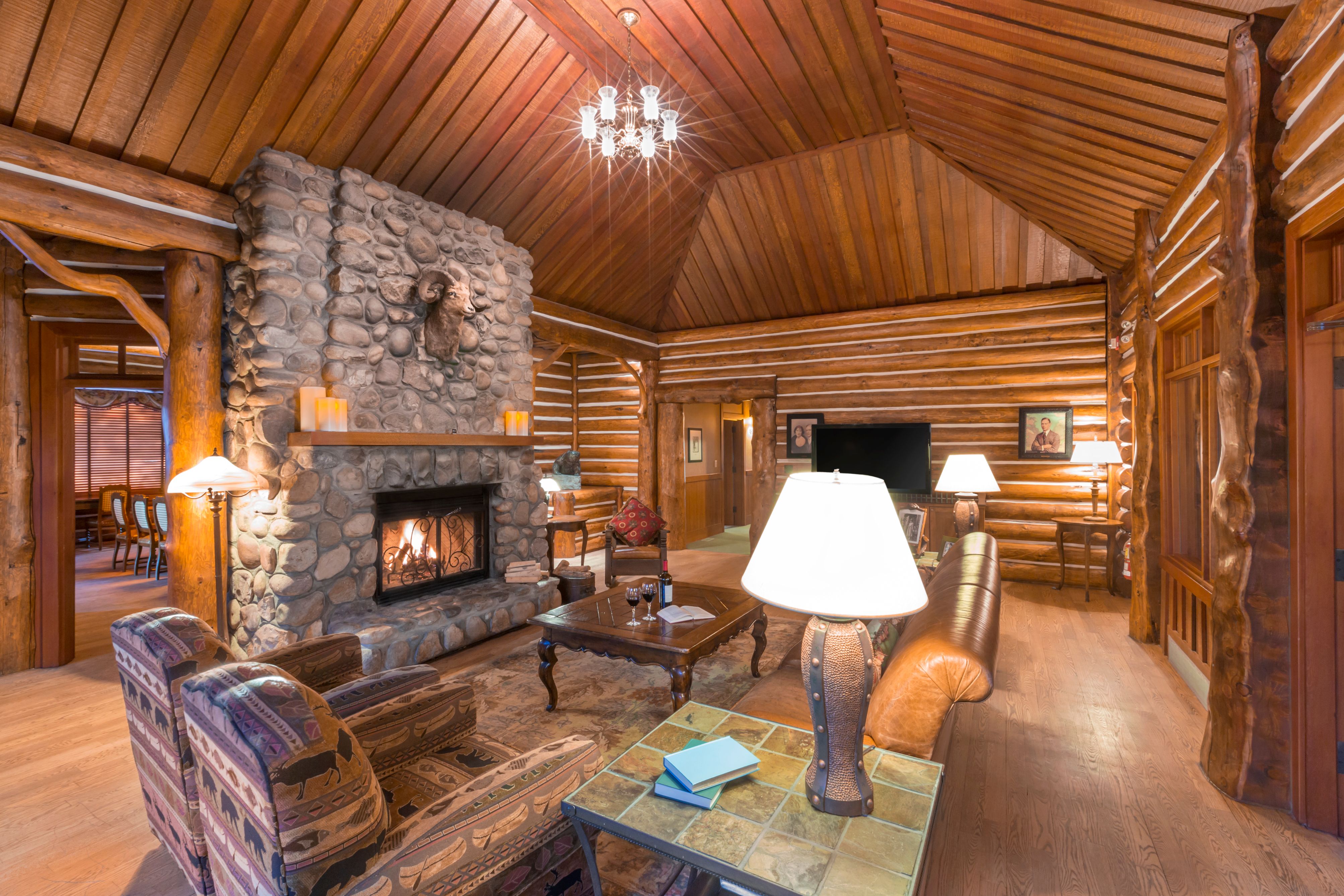 a living room with a fireplace and a couch