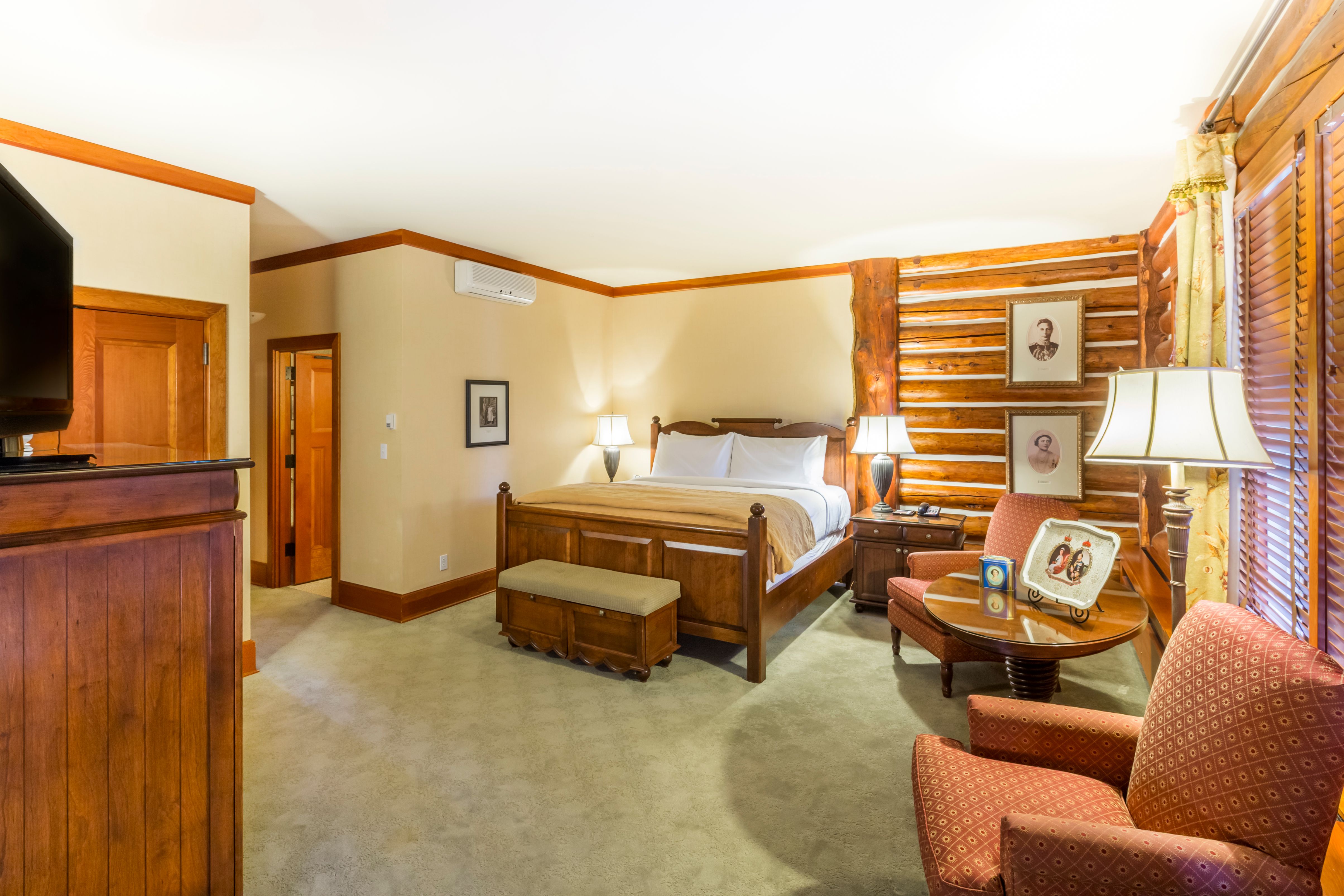 a room with a bed and a chair