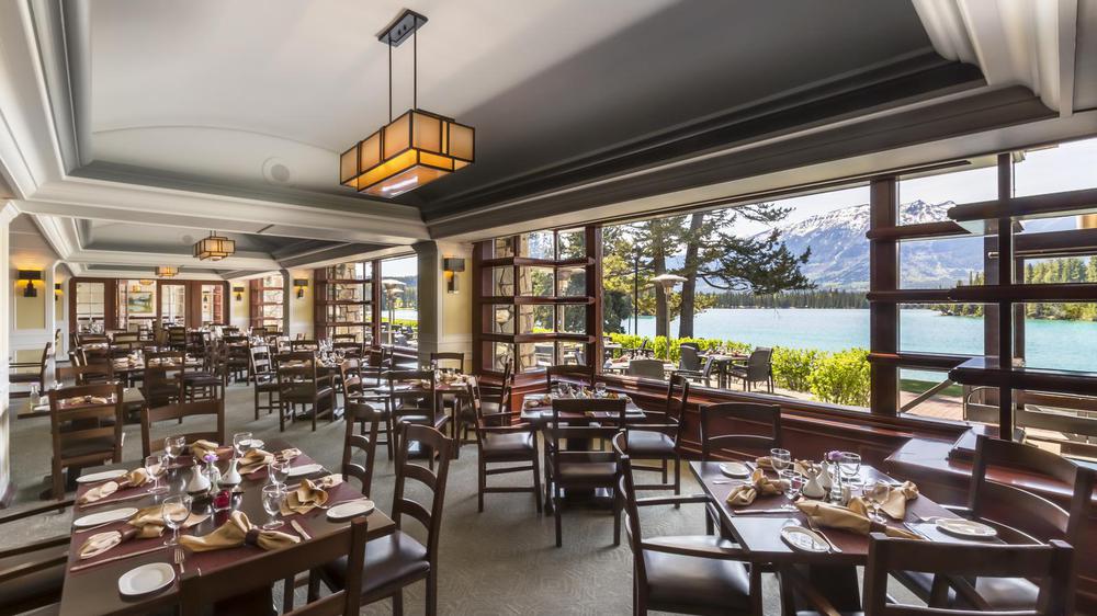 a restaurant with tables and chairs