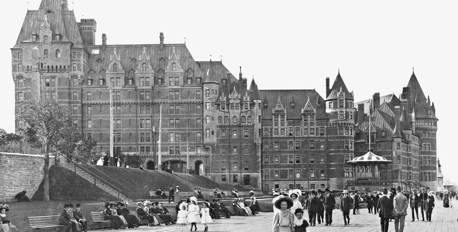a group of people in front of a large building