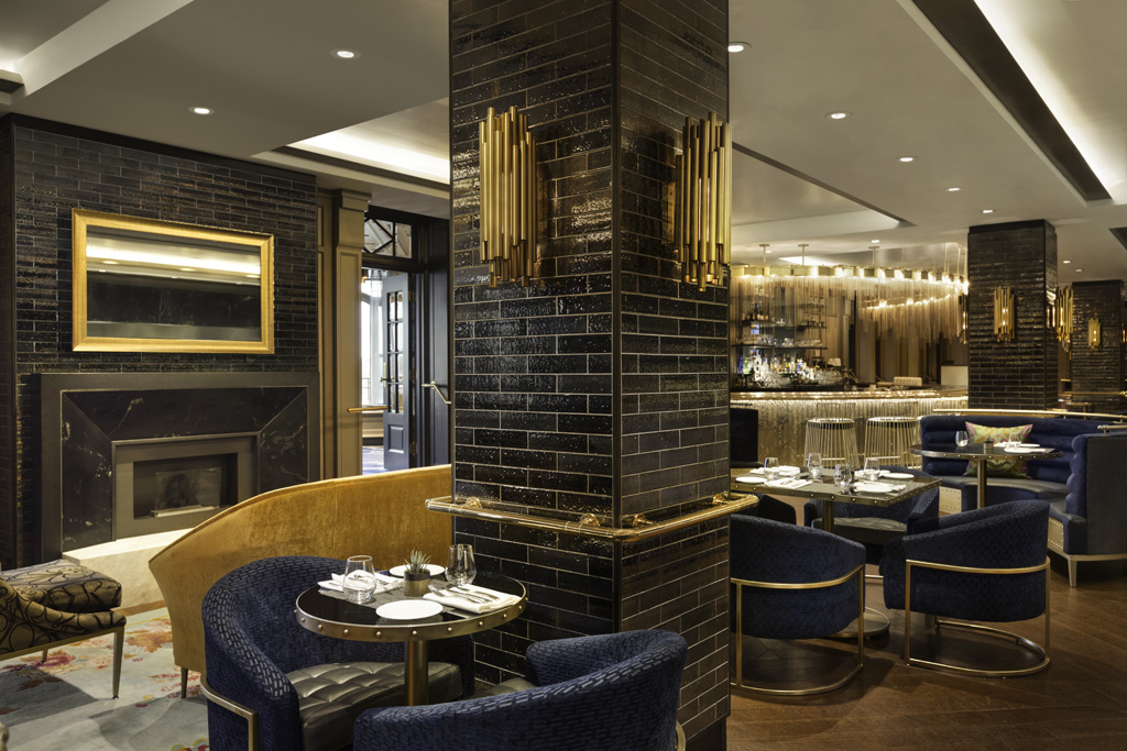 a restaurant with a column and tables