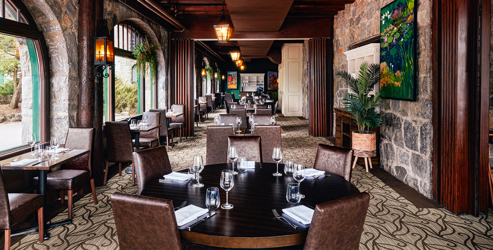 a restaurant with tables and chairs