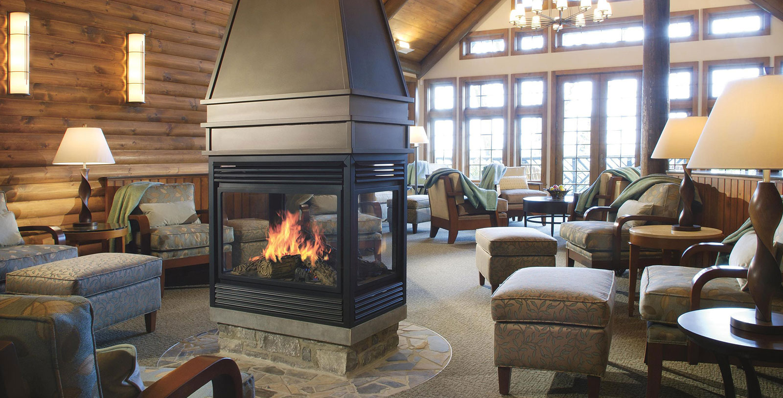 a fireplace in a room with a wood burning fireplace