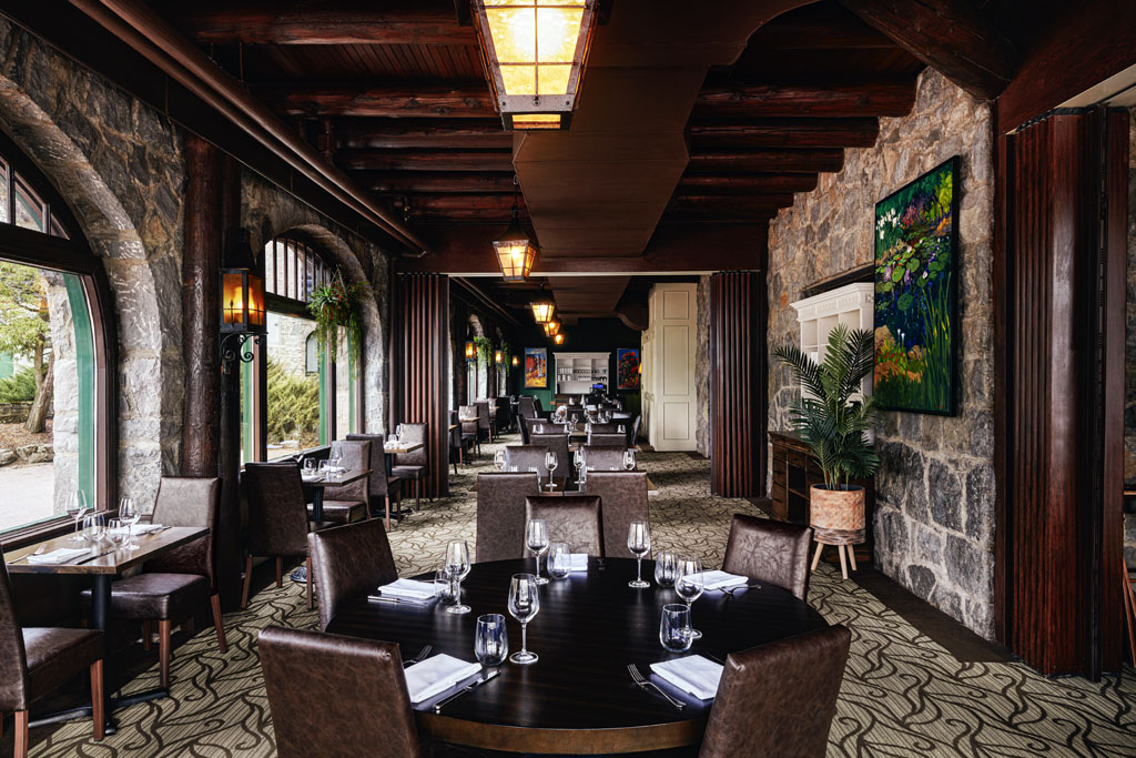 a restaurant with tables and chairs