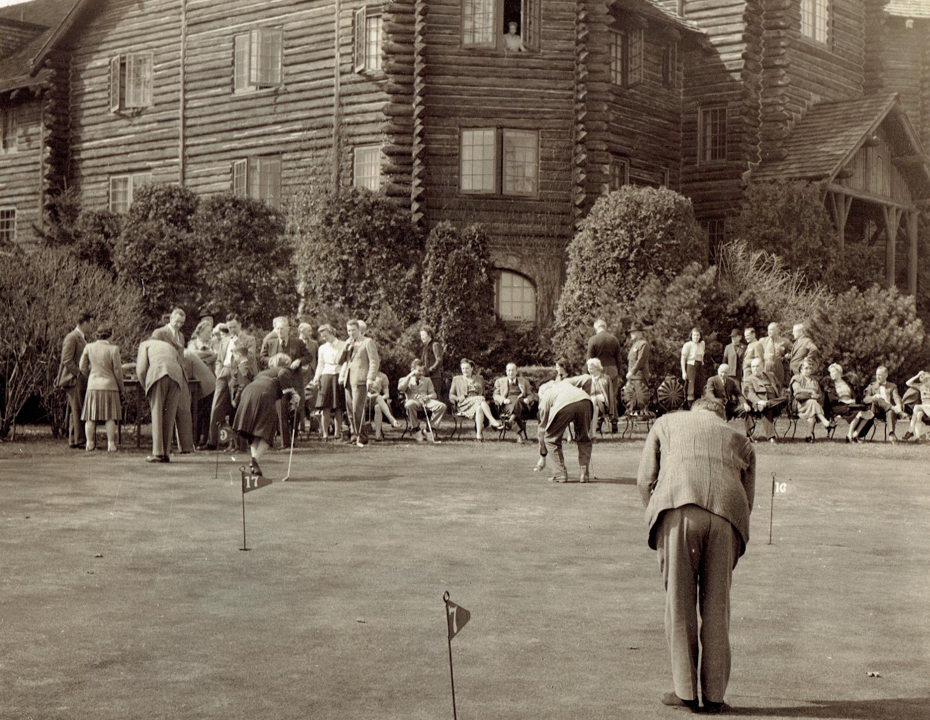 a group of people playing golf