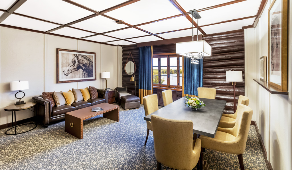 a room with a table and chairs