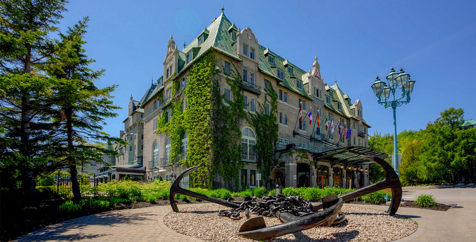 a large building with a large anchor in front of it
