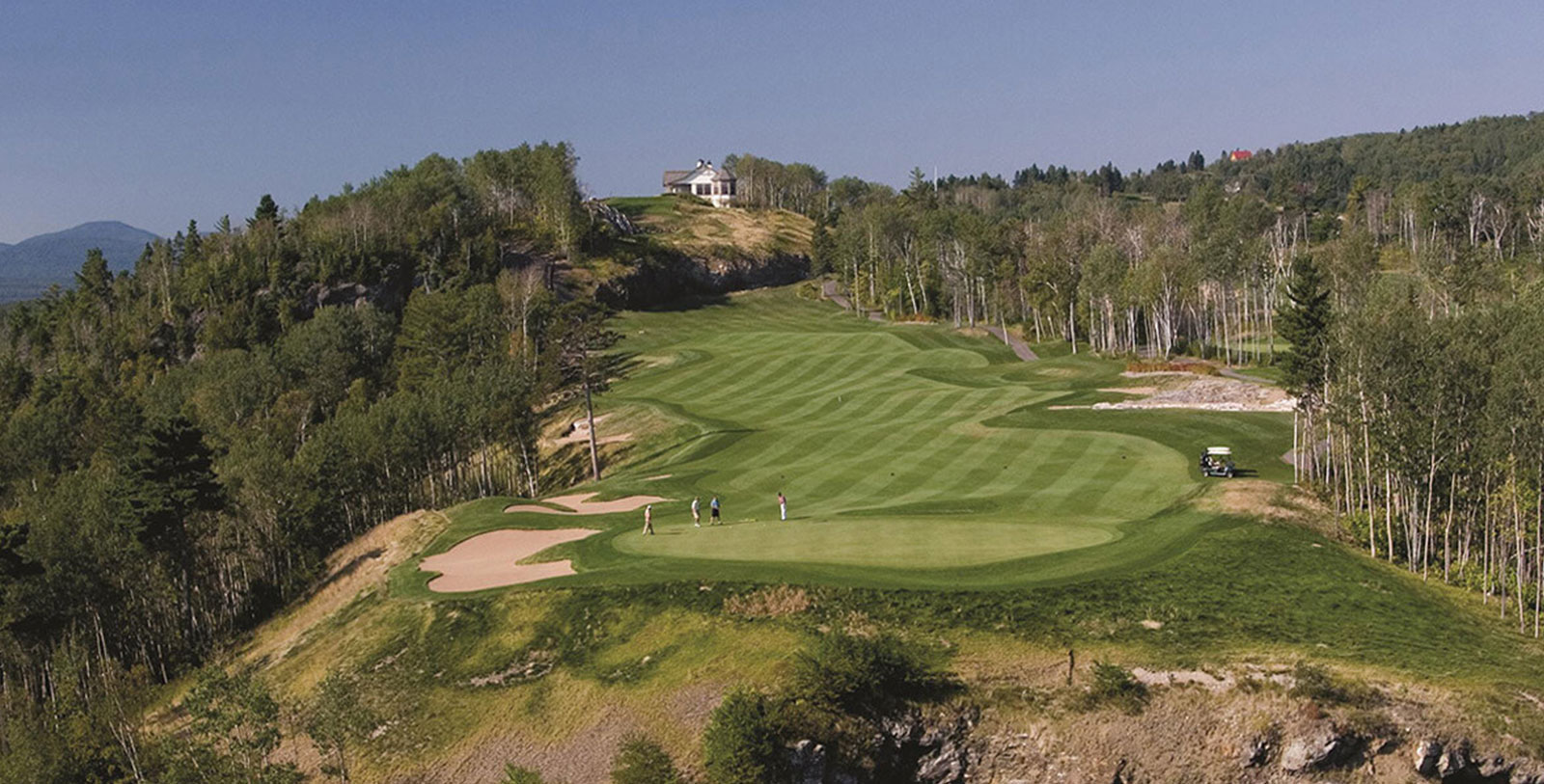 a group of people on a golf course