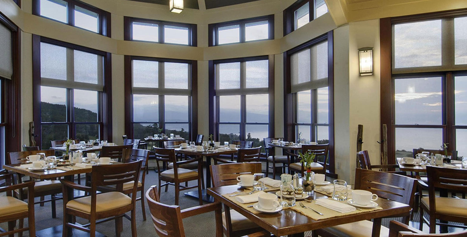 a restaurant with tables and chairs