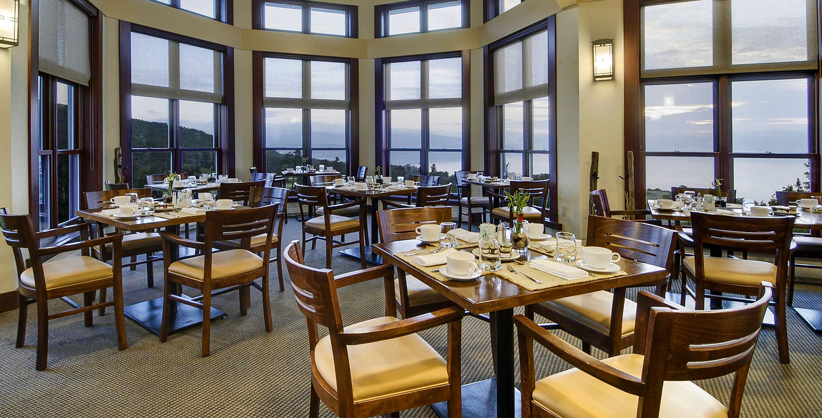 a restaurant with tables and chairs