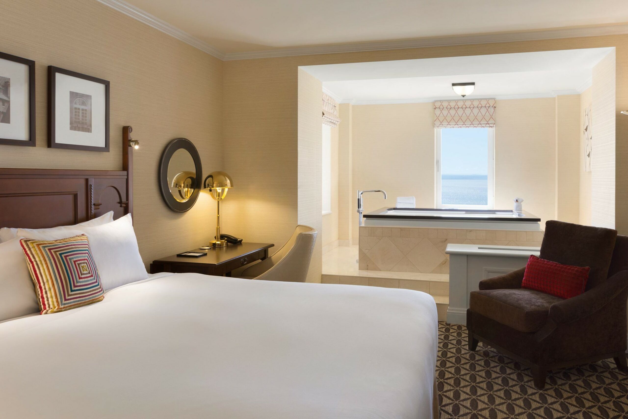 a room with a bed and a bathtub