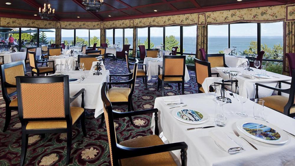 a restaurant with tables and chairs