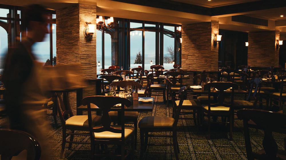 a restaurant with tables and chairs