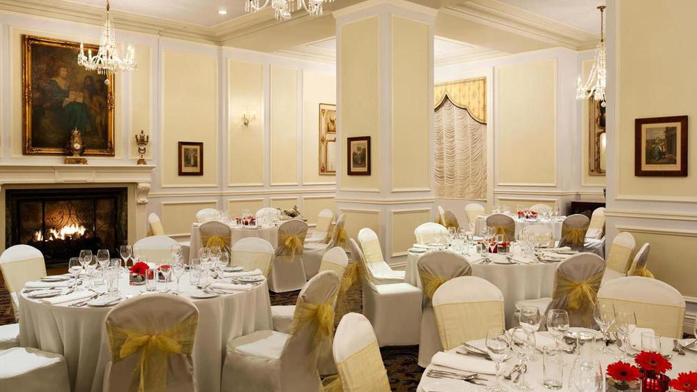 a room with tables and chairs