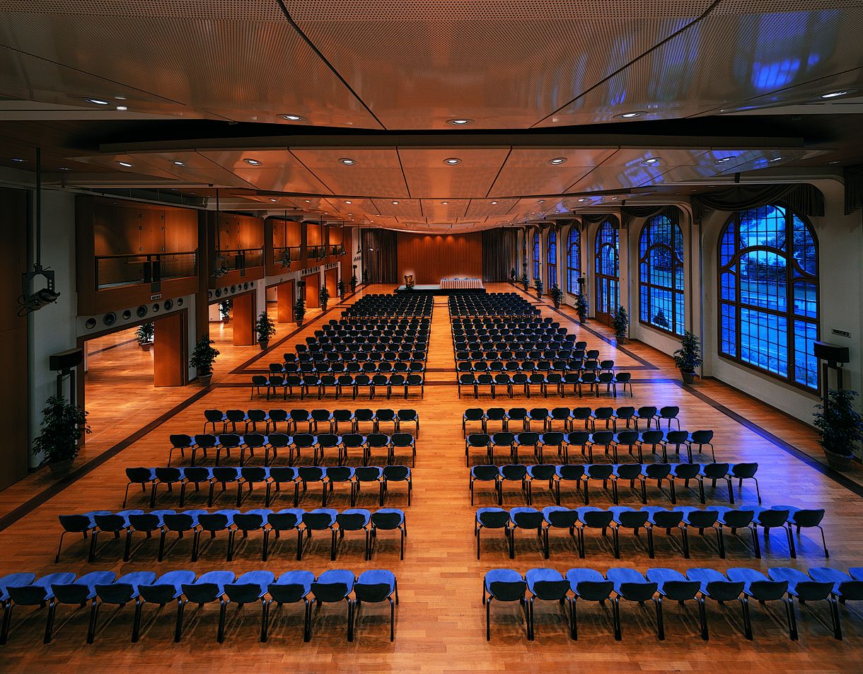 a large room with rows of chairs