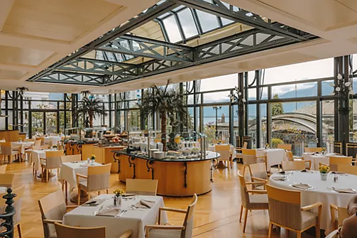 a restaurant with tables and chairs