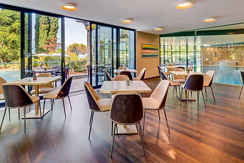 a room with tables and chairs