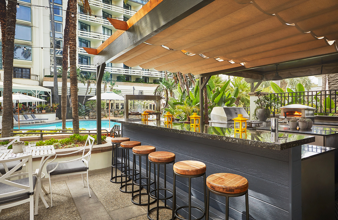 a bar with stools and chairs