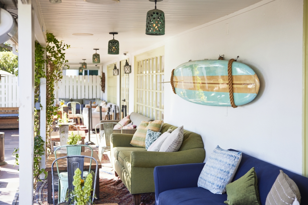 a couches and chairs on a porch