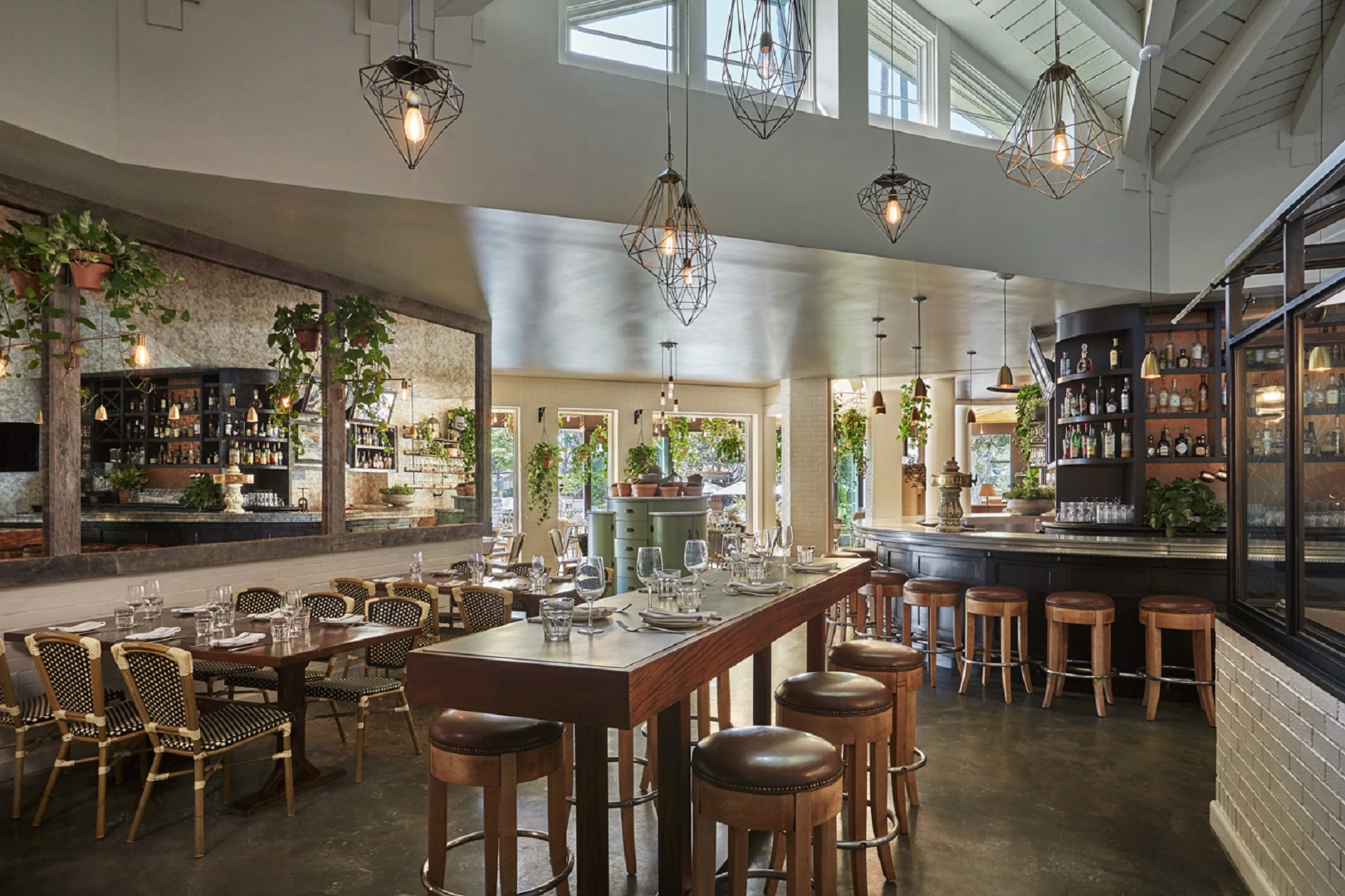 a restaurant with tables and chairs
