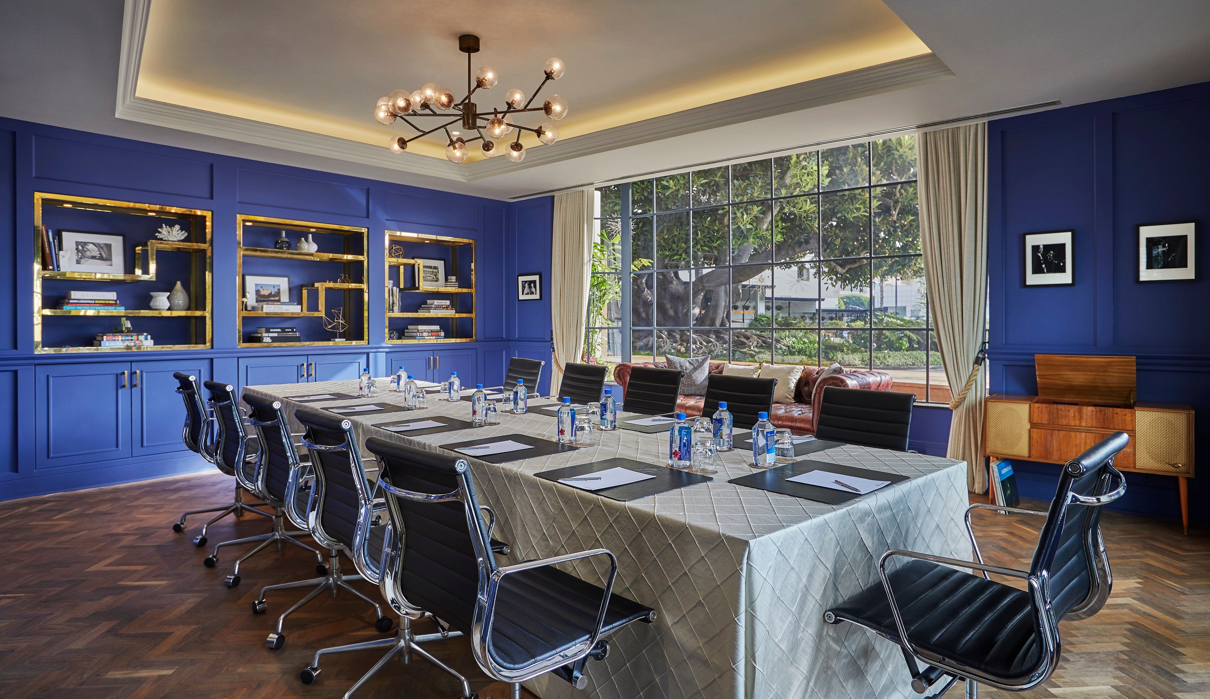 a conference room with a table and chairs