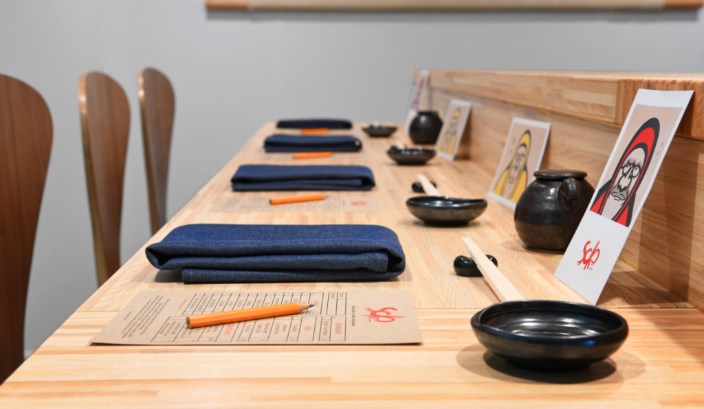 a table with plates and bowls on it