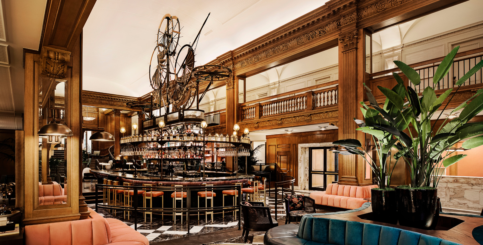 a room with a bar and a bicycle from the ceiling