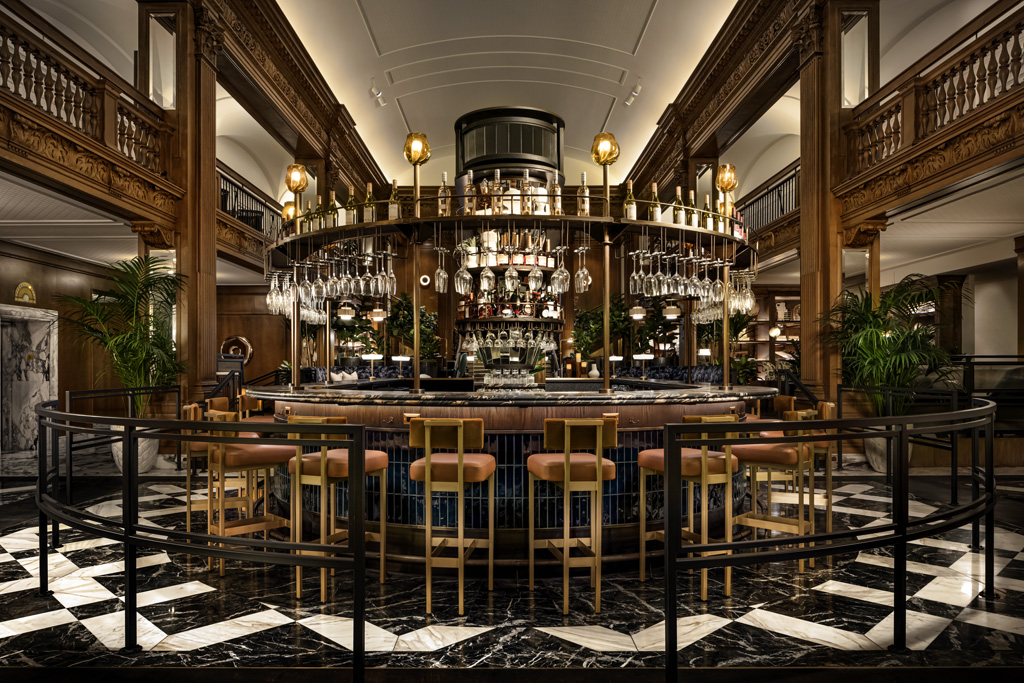 a bar with a bar and chairs