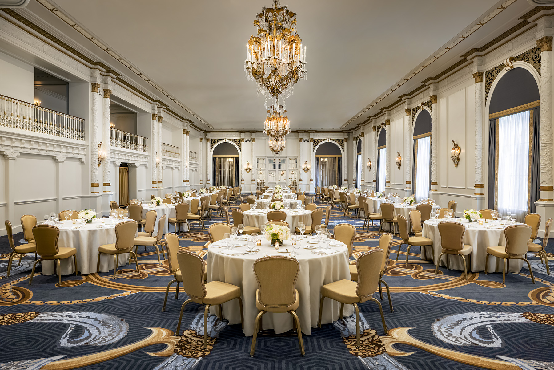 a large room with tables and chairs