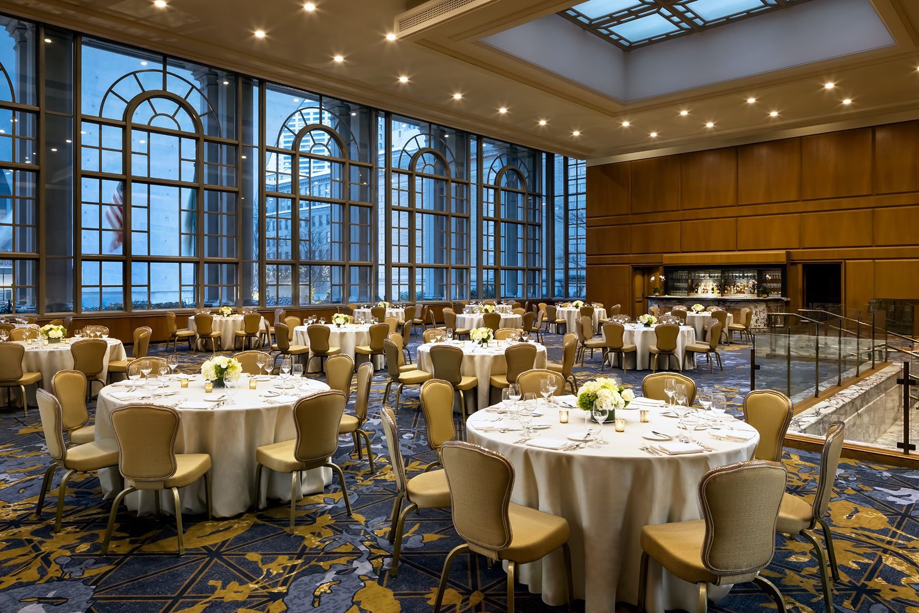 a room with tables and chairs