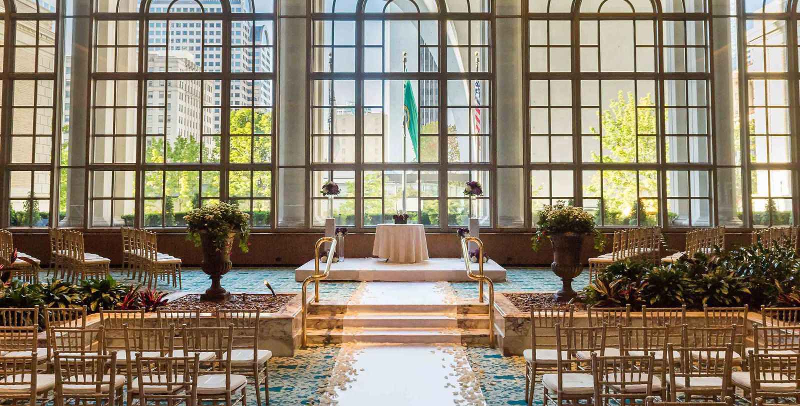 a wedding ceremony with a large window