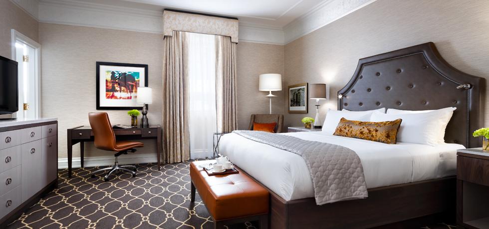 a room with a bed and a chair