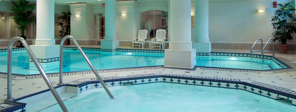 a pool with a person in the background