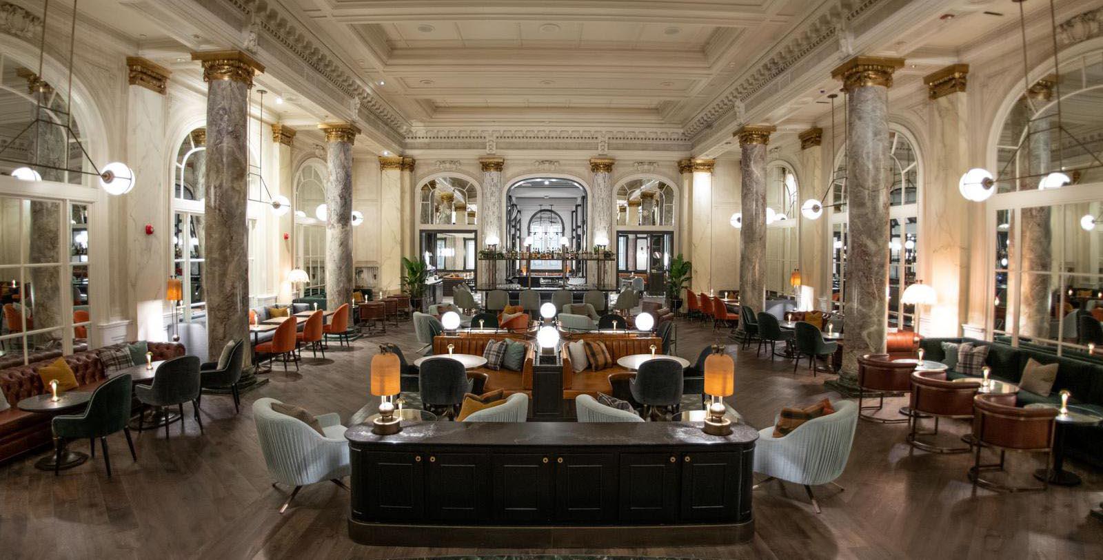 a large room with chairs and tables