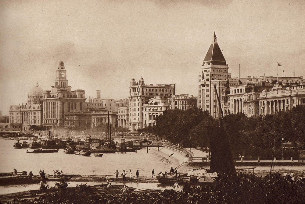 a city with boats and buildings