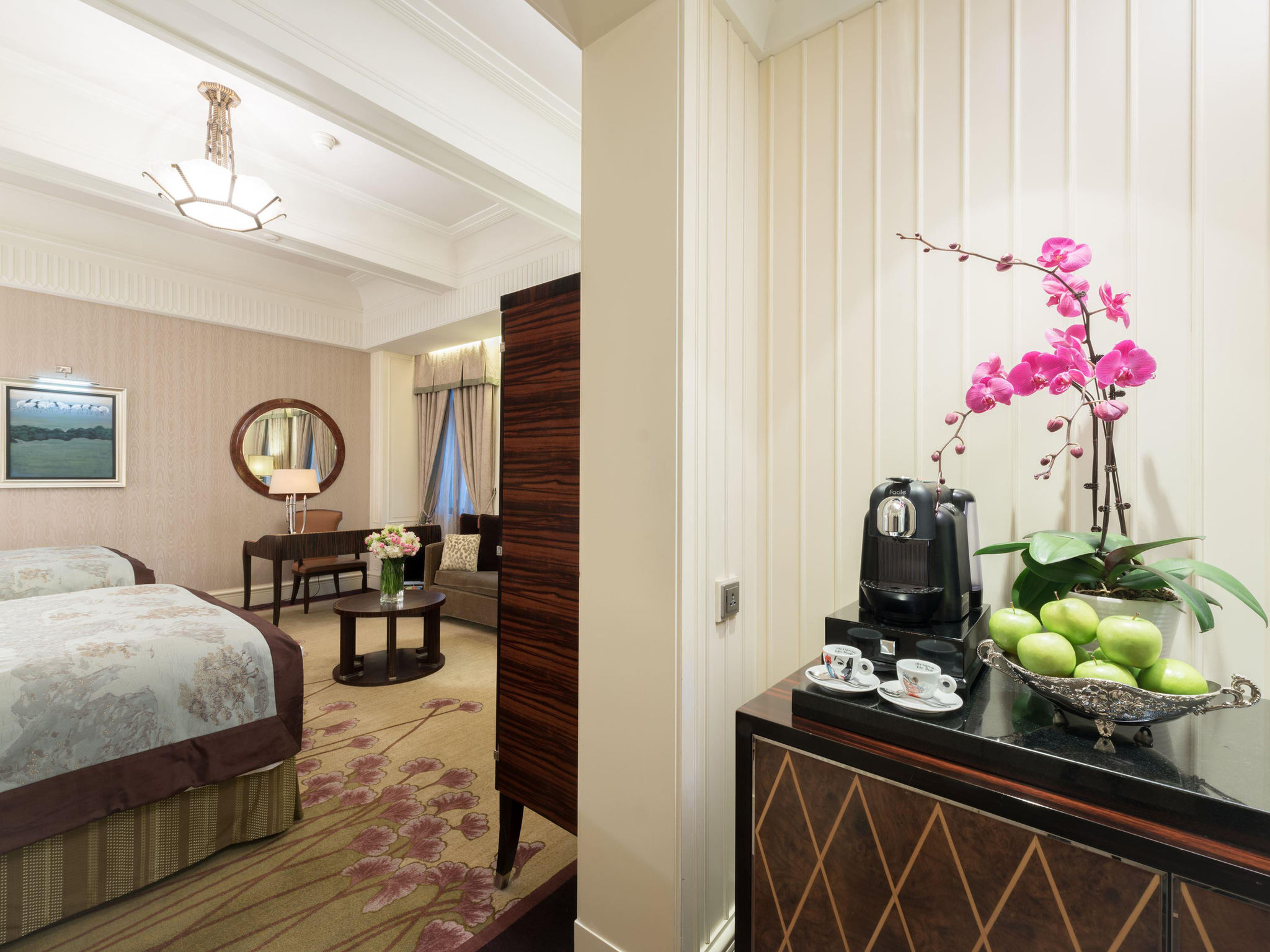 a room with a bed and a mirror